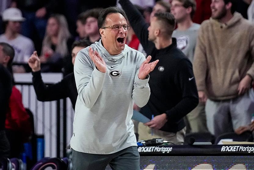 Georgia's Tom Crean celebrates during a game. 